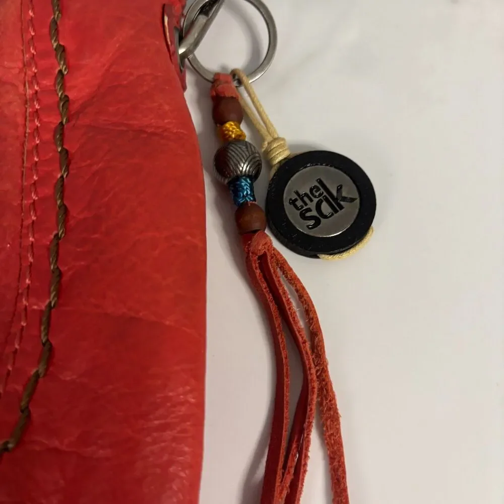 The Sak Indio Hobo Bag Purse Shoulder Leather Baguette Braided Strap Orange